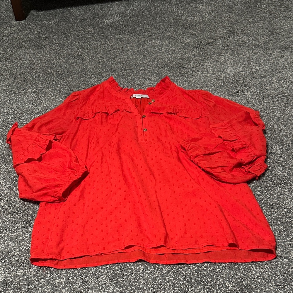 Women’s red blouse.